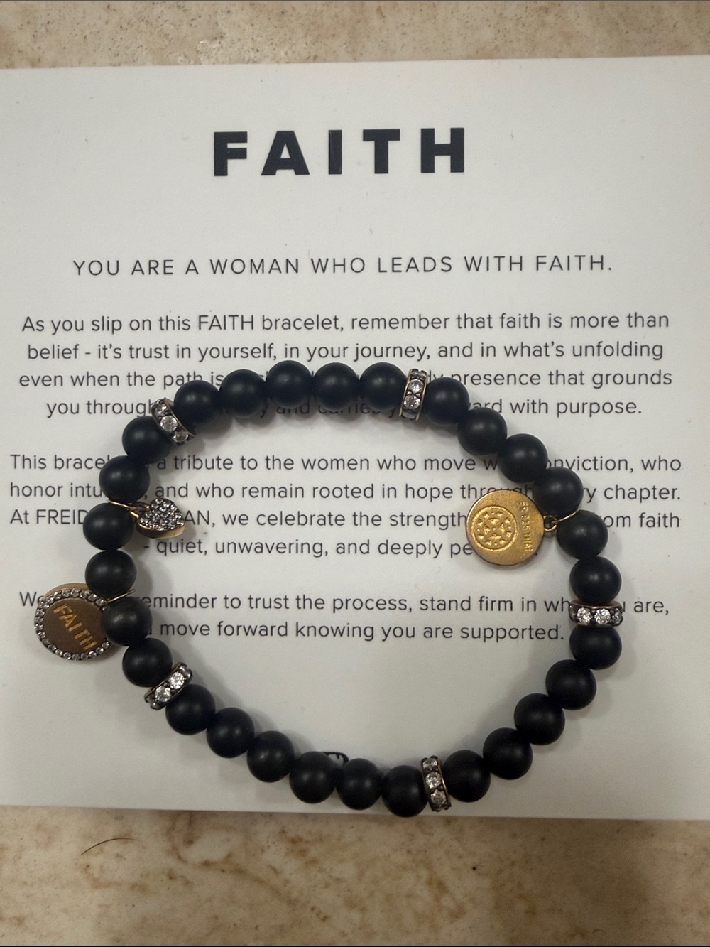 Black Beaded Bracelet with Gold Charms